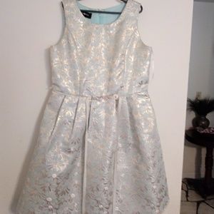 Little girl dress. Light green, gold and white